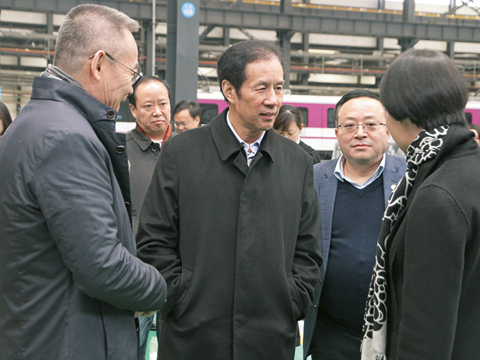  原四川省人大副主任陈光志一行莅临四川发展必发888股份调研指导工作,公司董事长肖光辉陪同